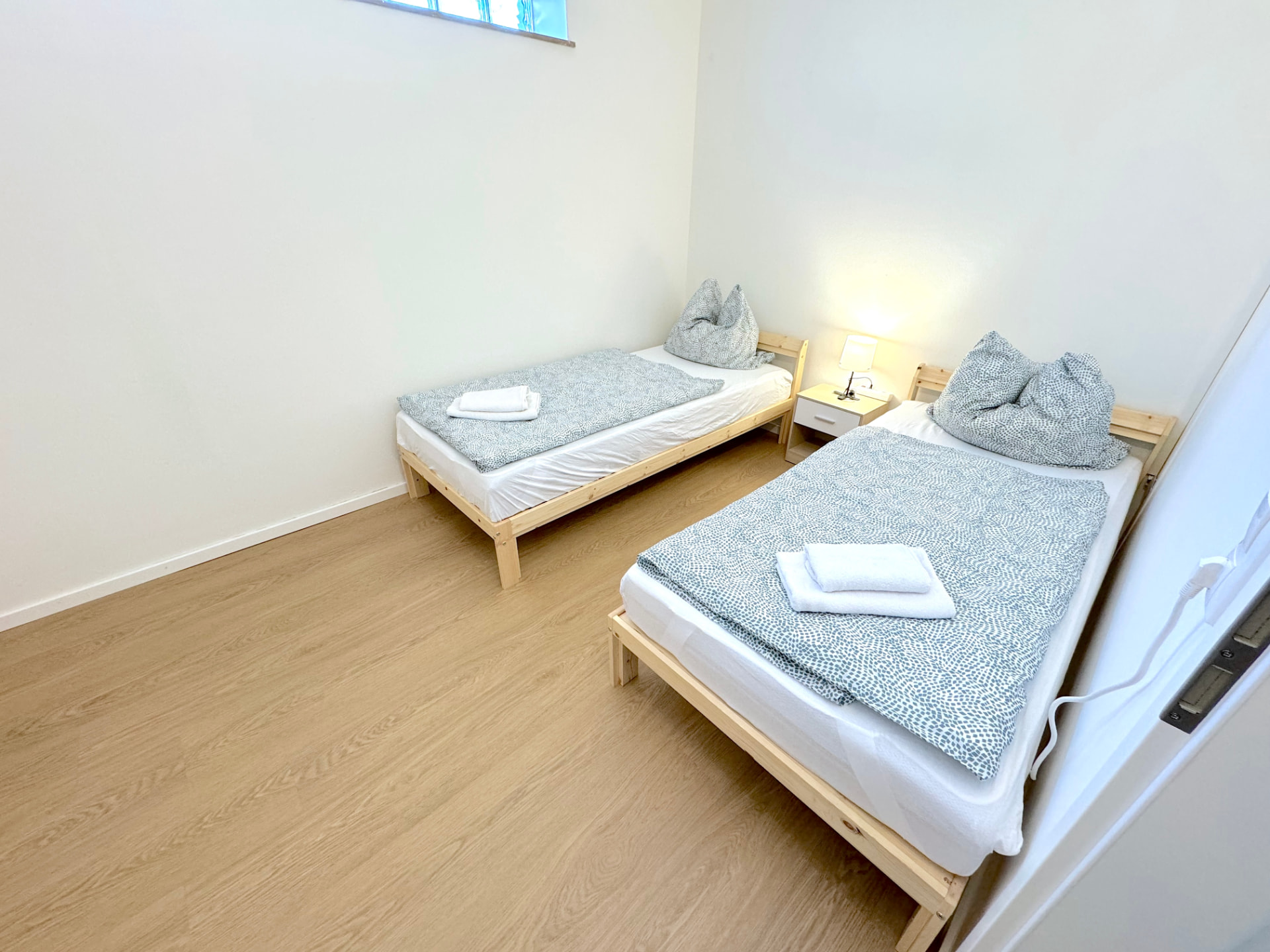 Apartment I in Kronwieden – Heller Schlafraum mit zwei Einzelbetten